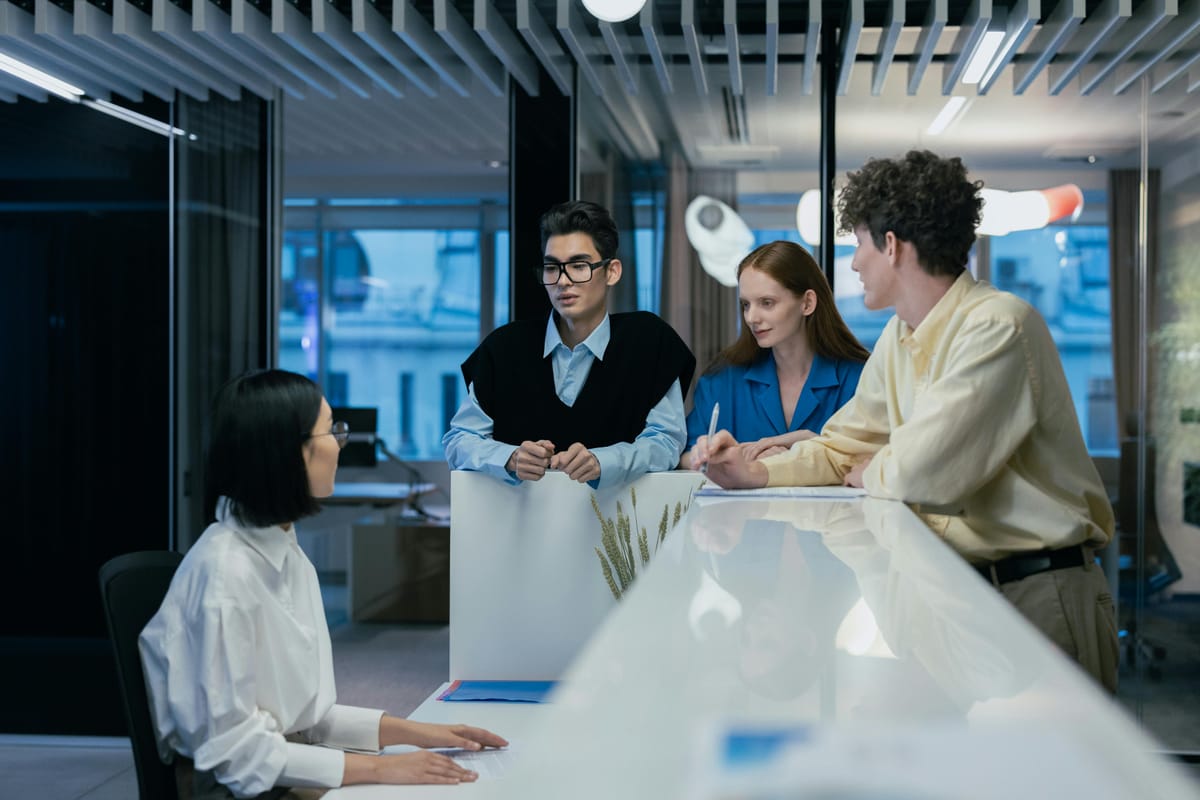 People discussing in the office.