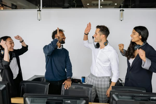People celebrating in the office.